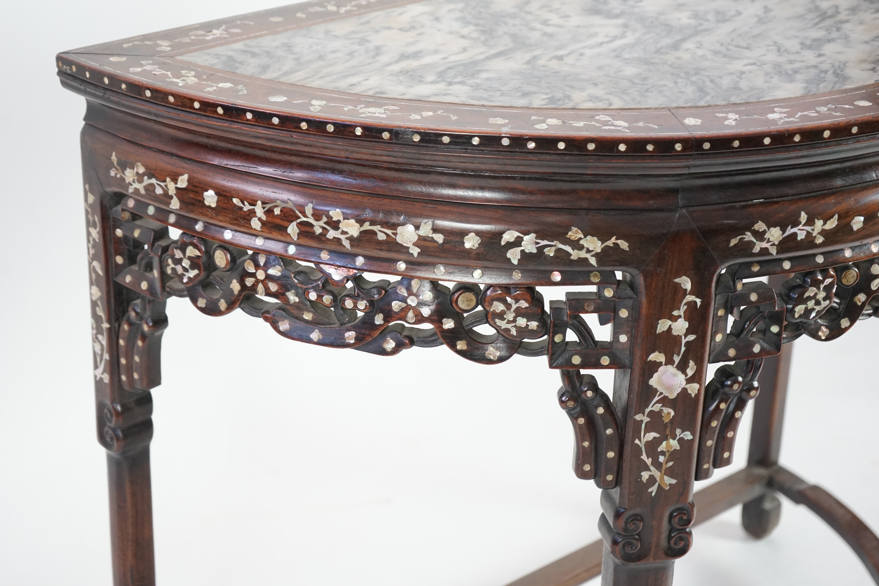 A Chinese hongmu and floral mother of pearl inlaid console table, late 19th/early 20th century